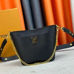 Louis Vuitton Lock and Walk bucket bag